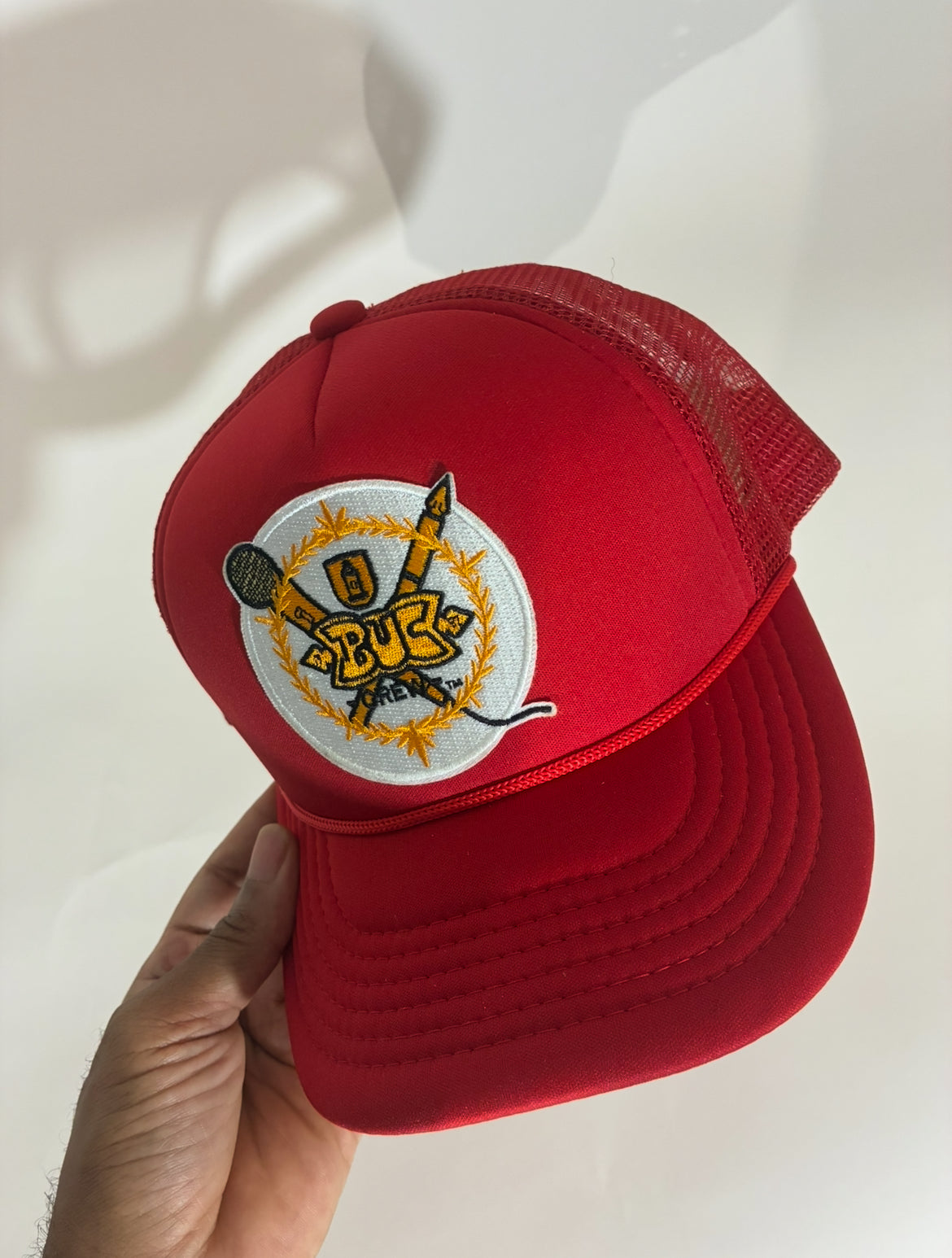 BLACK ON BOTH SIDES CAPSULE RED TRUCKER HAT
