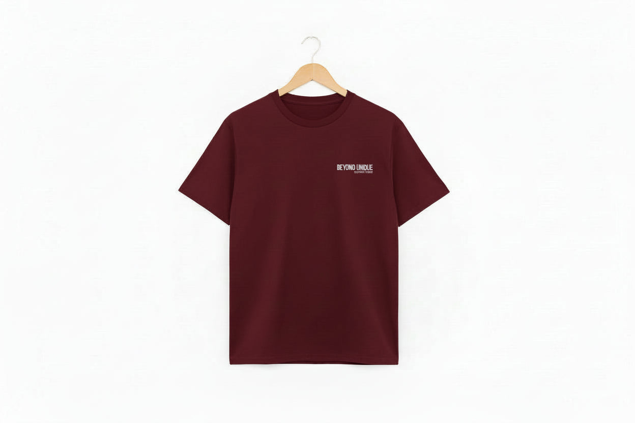 Burgundy member T, small chest font logo in white ink screen print. 
